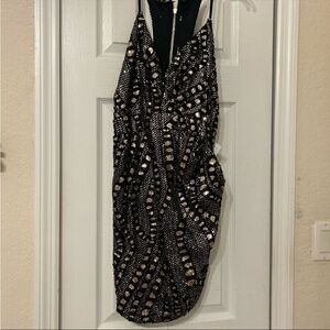 The Boutique Black and Gold Open Back Dress